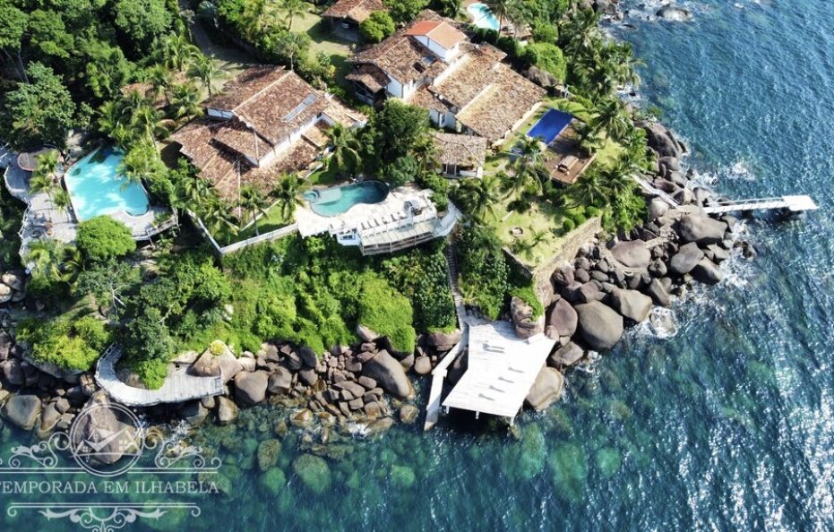 Linda residência de costeira com 7 suítes, piscina e pier privativo com poita – Praia do Curral